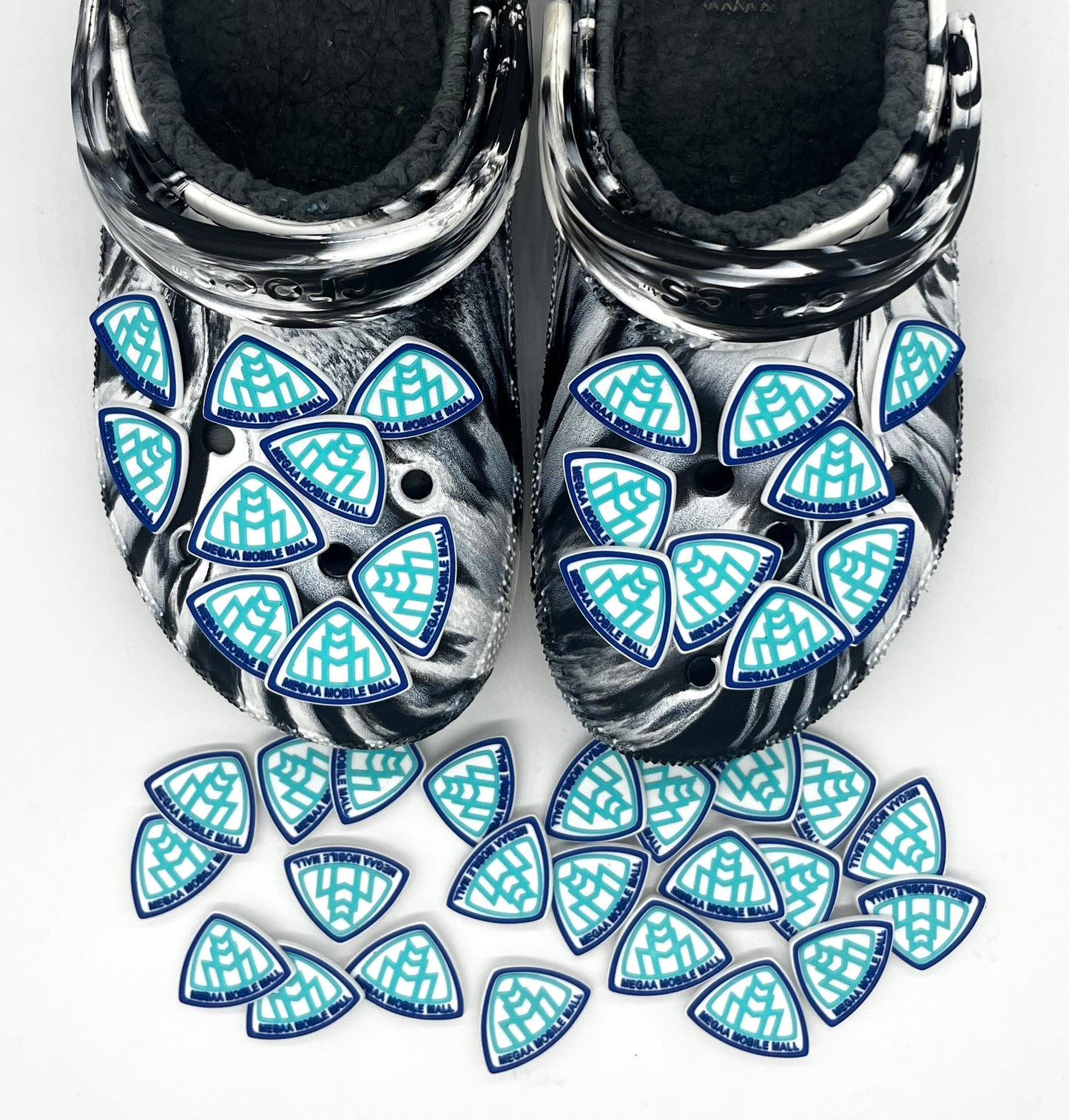 megaamobilemall Logo Croc Jibbitz on tie dye crocs