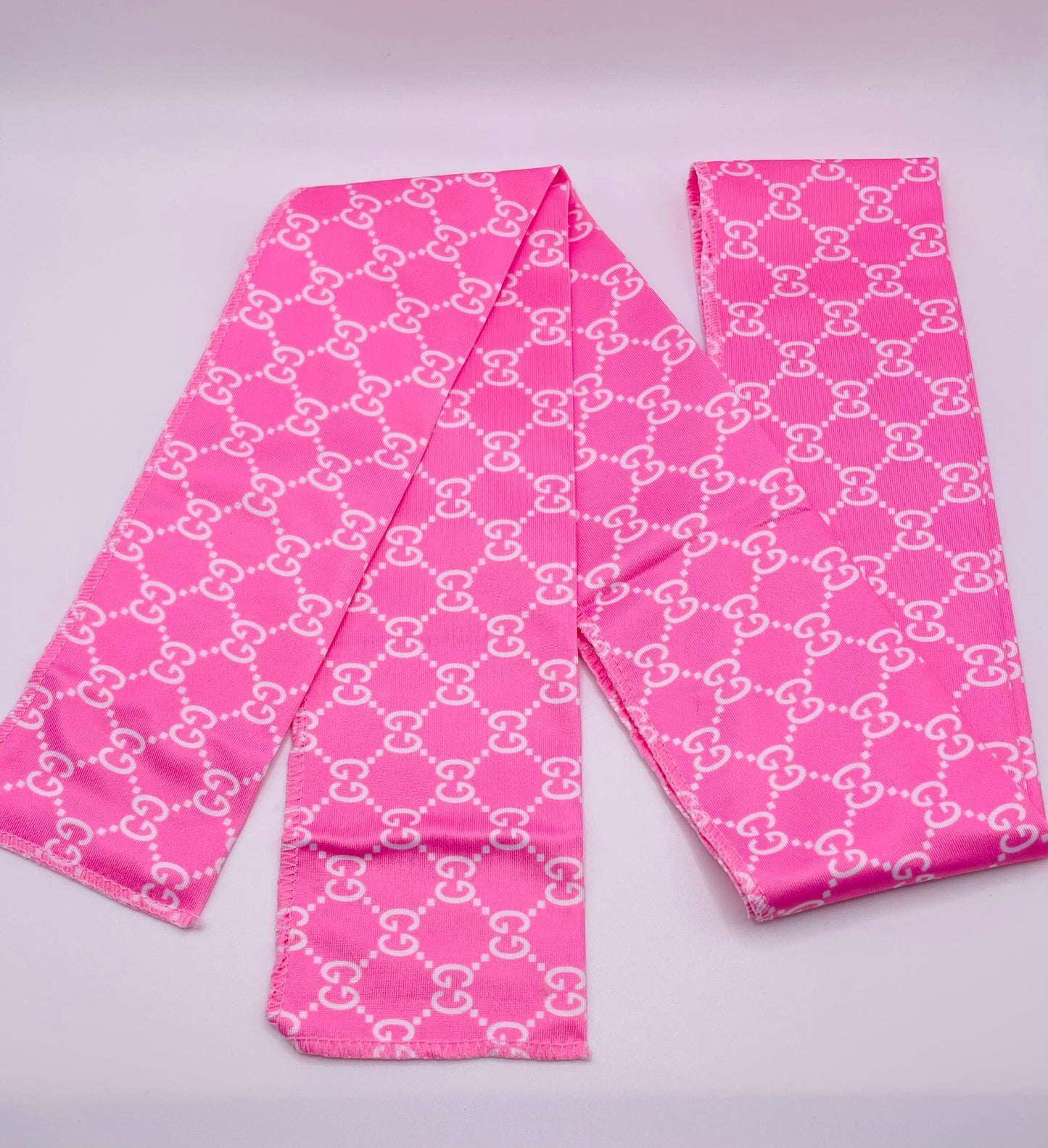 Lazo para el pelo rosa con GG