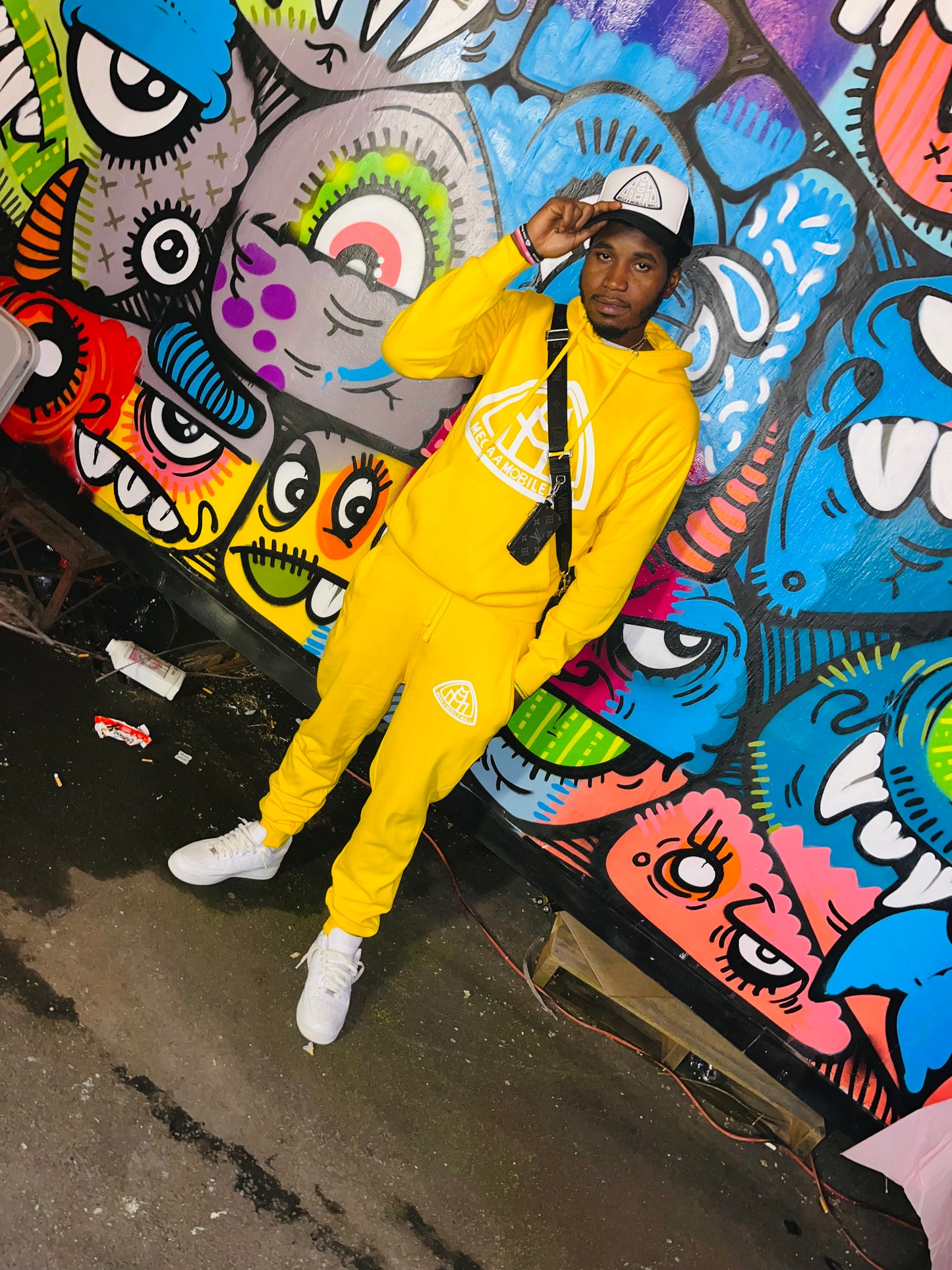 model wearing megaamobilemall Yellow Logo Sweatsuit sky blue logo
