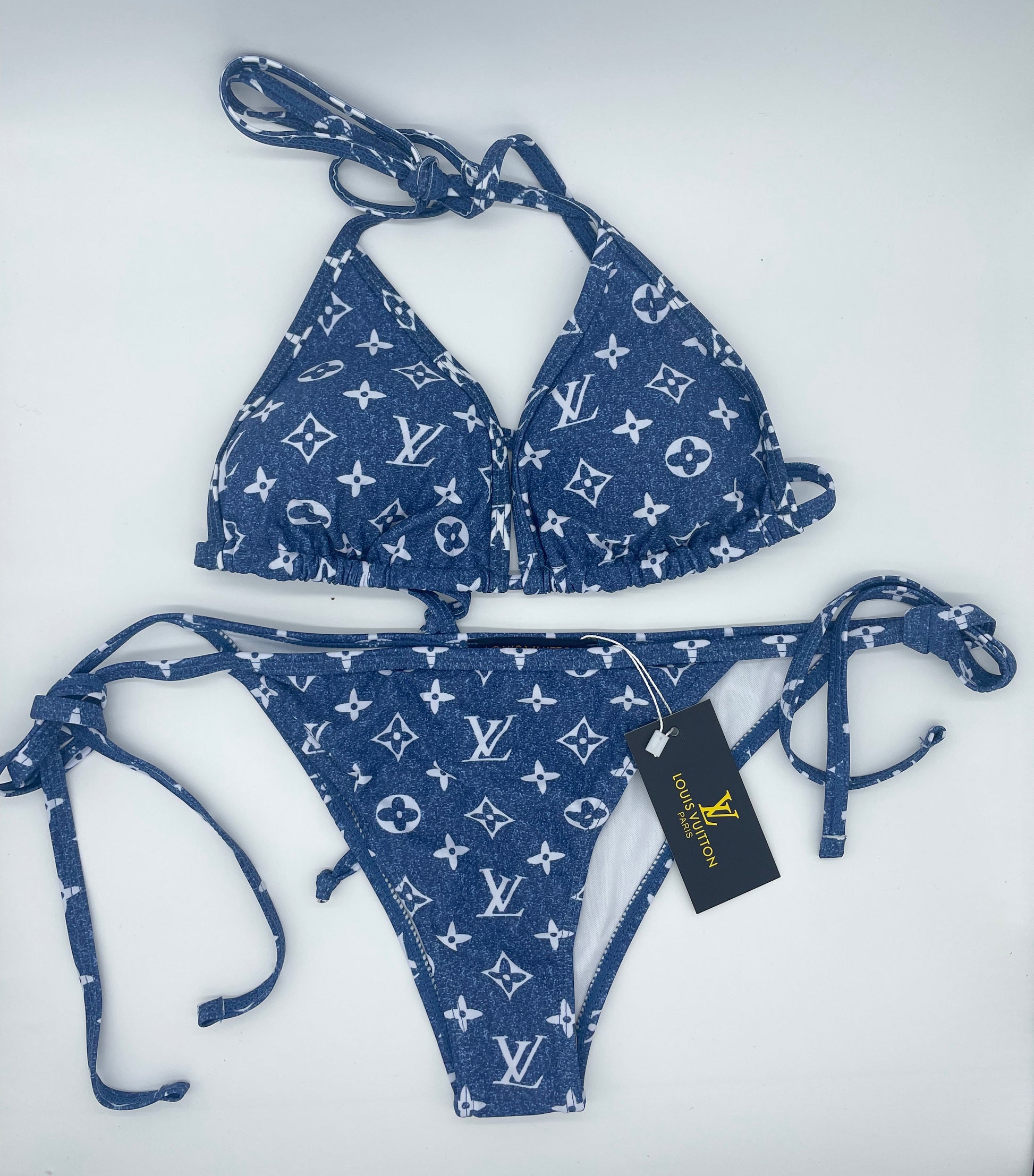 hennessycarolina wearing a light grey @louisvuitton inverted mahina  monogram bikini top ($485.00) and white and black @louisvuitton…