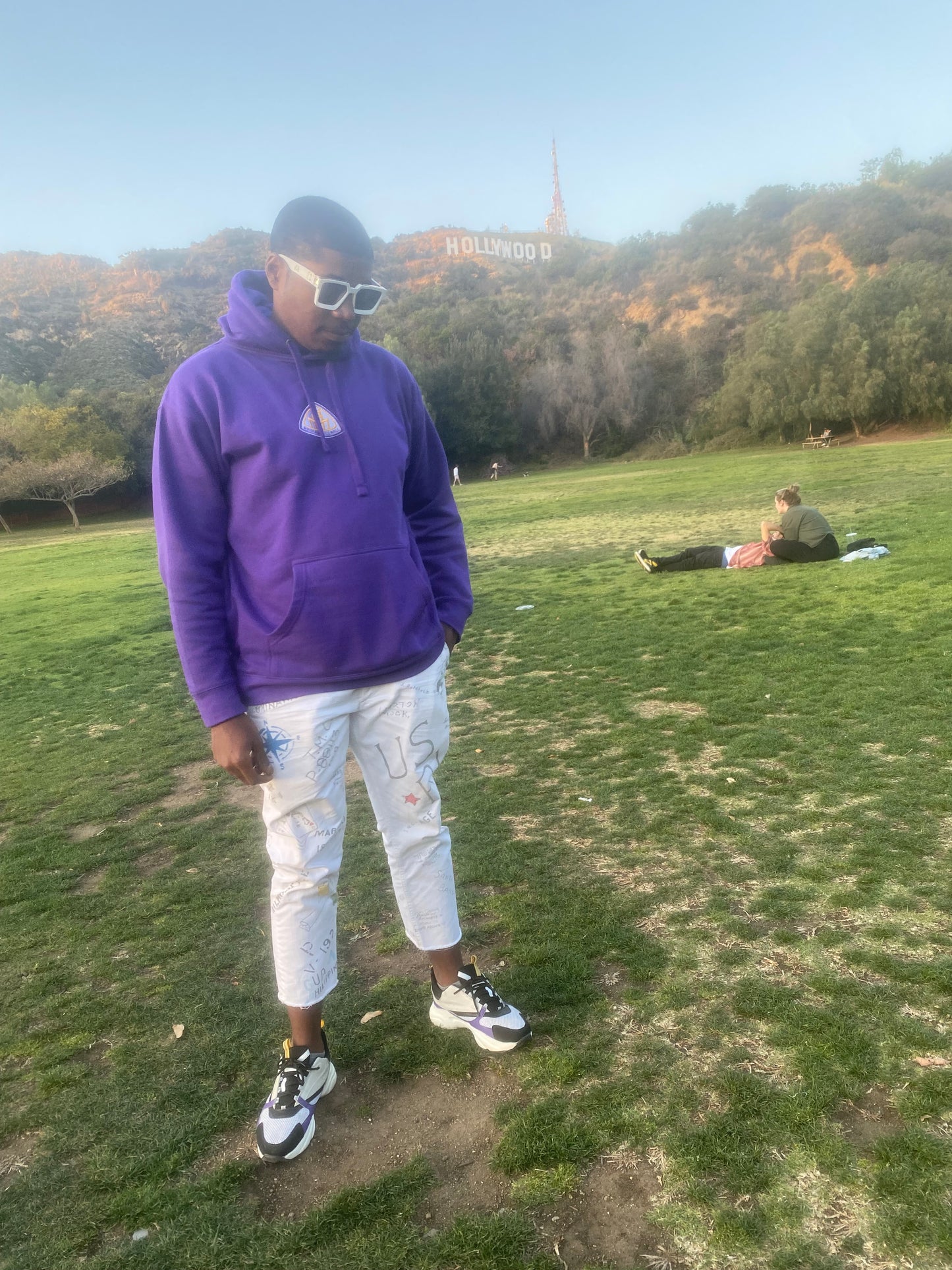 model wearing purple LA Logo Hoodie